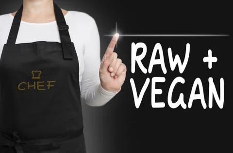 Raw and vegan touchscreen is operated by chef concept Stock Photos
