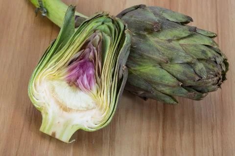 Raw artichokes Stock Photos
