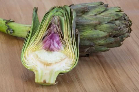 Raw artichokes Stock Photos