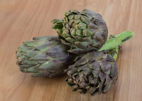 Raw artichokes Stock Photos
