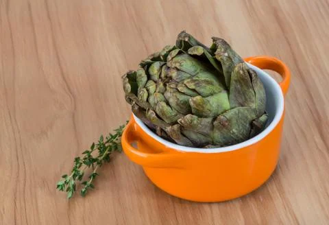 Raw artichokes Stock Photos
