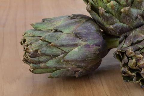 Raw artichokes Stock Photos