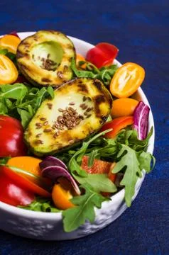 Raw arugula with vegetables Stock Photos