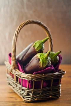 Raw aubergines Stock Photos