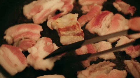 Raw bacon baking in pan Stock Footage 39828359