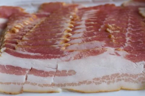 Raw bacon slices. Foto stock