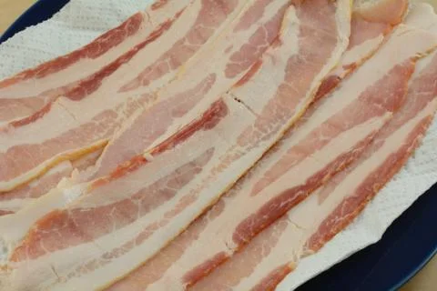 Raw bacon strips Stock Photos