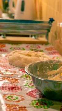Raw balls of bread in the kitchen table Stock Photos