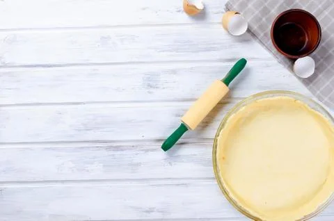 Raw base of pastry for baking in a baking dish 写真素材