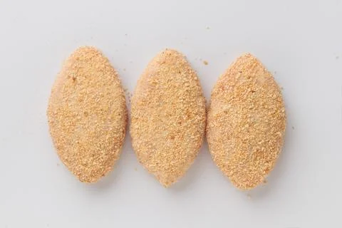 Raw beached meat cutlets isolated on a white background Stock Photos