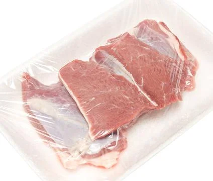Raw beaf meat raw meat in plastic tray isolated on white background ,model... Stock Photos
