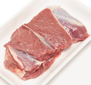 Raw beaf meat raw meat in plastic tray isolated on white background ,model... Stock Photos