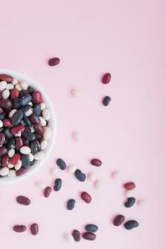 Raw beans in a cup on the background Stock Photos