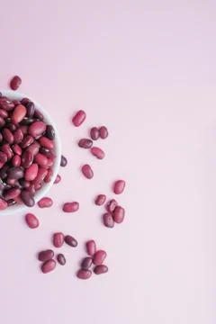 Raw beans in a cup on the background Stock Photos