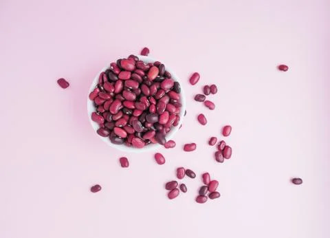Raw beans in a cup on the background Stock Photos