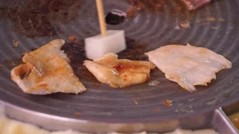 Raw beef and chicken on the stove for the grill process Stock Footage 137642870