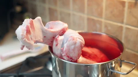 Raw beef bone for domestic pet feeding, meat wastes as a natural food for pets Stock Footage 344647921