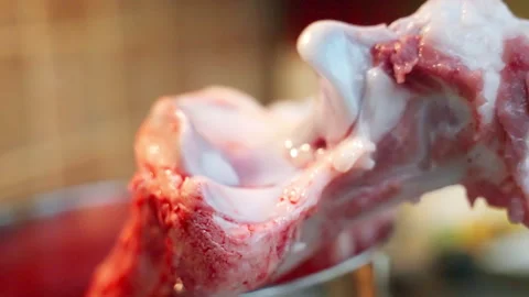 Raw beef bone in pan for boiling, process of preparation natural collagen at Stock Footage 269780610