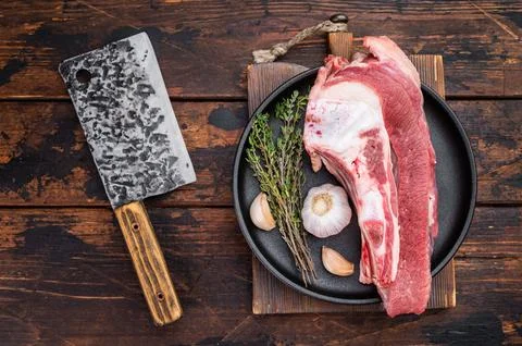 Raw beef bone with thick meat attached, butcher style cut ideal for roastin.. Stock Photos