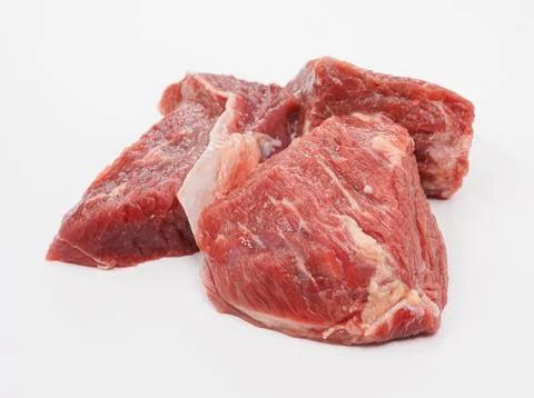 Raw Beef Chunks on White Background for Kitchen Foto stock
