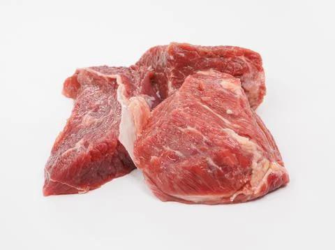 Raw Beef Chunks on White Background for Kitchen Foto stock
