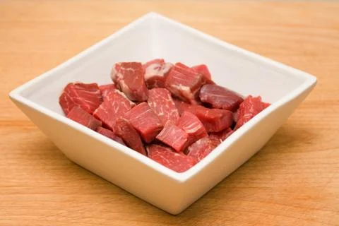 Raw beef cubes Stock Photos