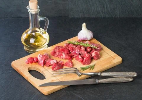 Raw beef cubes Stock Photos