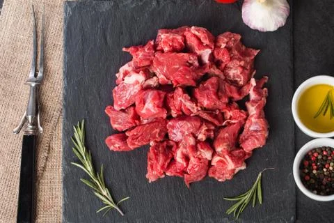 Raw beef cubes Stock Photos
