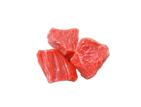 Raw beef cut into cubes Stock Photos