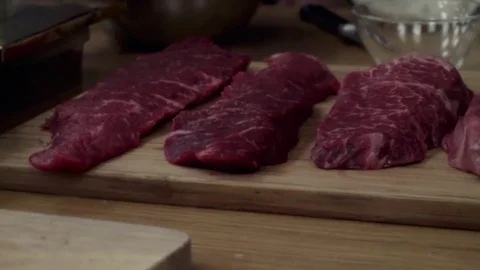 Raw beef on cutting board Video stock 79506950