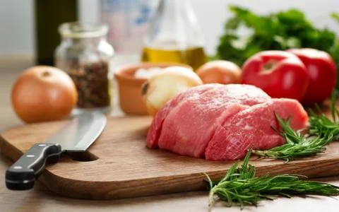 Raw beef on cutting board Stock Photos