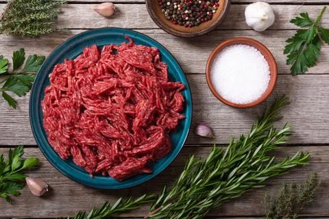 Raw beef ground with ingredient Stock Photos