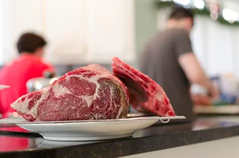 Raw Beef in Kitchen Stock Photos