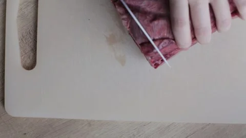 Raw beef lung on a plastic board. Preparing beef lung for food Stock Footage 240300311