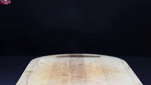 Raw beef meat on a black background Stock Footage 126573551