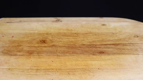 Raw beef meat on a black background Stock Footage 128284569