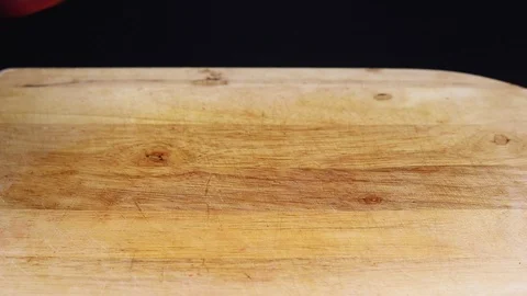 Raw beef meat on a black background Stock Footage 128284803