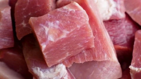 Raw beef meat chopped in cubes, 4k slow motion Stock Footage 254081835