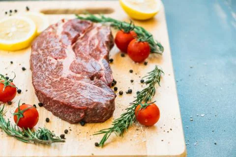 Raw beef meat on cutting board Stock Photos