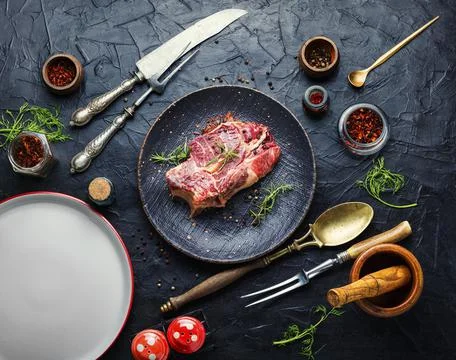 Raw beef meat on the plate Stock Photos