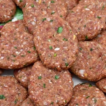 Raw beef meatballs made with various homemade spices, raw beef kofte kofta Stock Photos