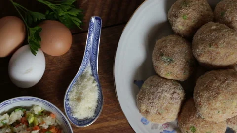 Raw beef meatballs ready to be cooked Stock Footage 152879192