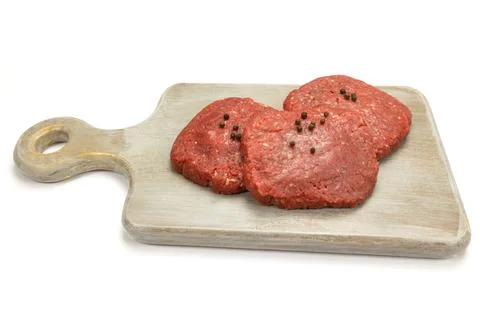 Raw beef minced steaks, close-up, isolated on a white background Stock-Fotos