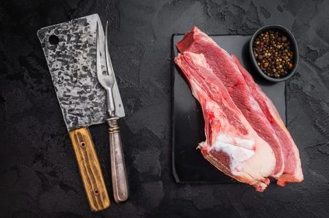 Raw beef rib cut with bone, marrow and connective tissue, perfect for simme.. Stock Photos