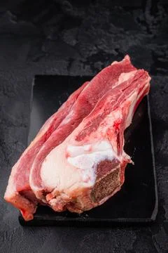 Raw beef rib cut with bone, marrow and connective tissue, perfect for simme.. Stock Photos