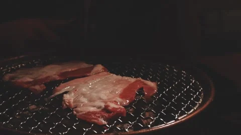 Raw beef slice for barbecue or Japanese style yakiniku Stock Footage 343615641
