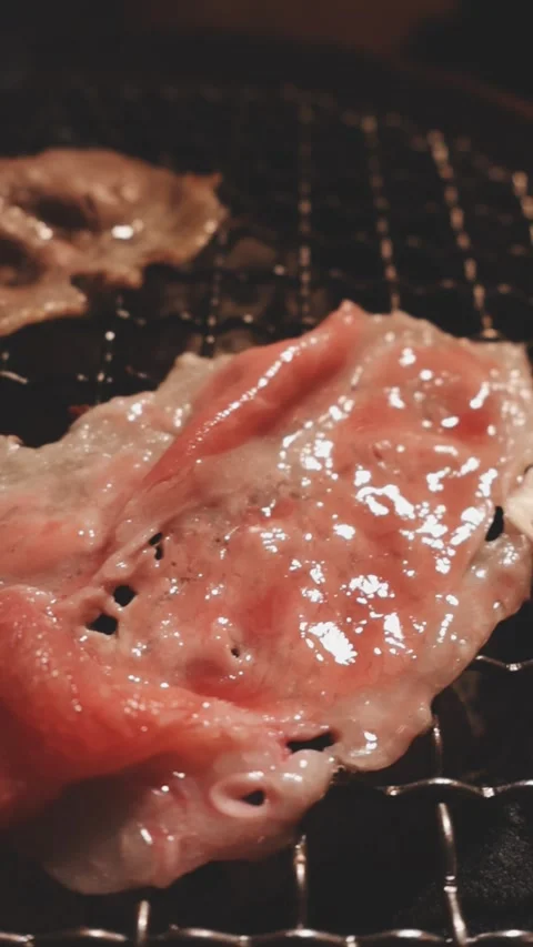 Raw beef slice for barbecue or Japanese style yakiniku Stock Footage 343615821