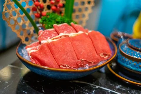 Raw beef slice for hot pot, fresh snowflake beef slices, chinese food. Select Stock Photos