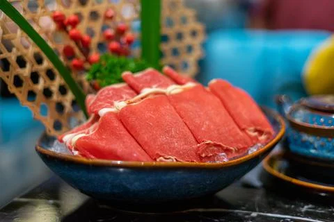 Raw beef slice for hot pot, fresh snowflake beef slices, chinese food. Select Stock Photos