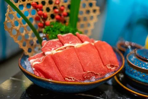 Raw beef slice for hot pot, fresh snowflake beef slices, chinese food. Select Stock Photos